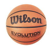 Close-up of a Wilson Evolution basketball, showcasing its distinctive orange color and grip texture for optimal performance.